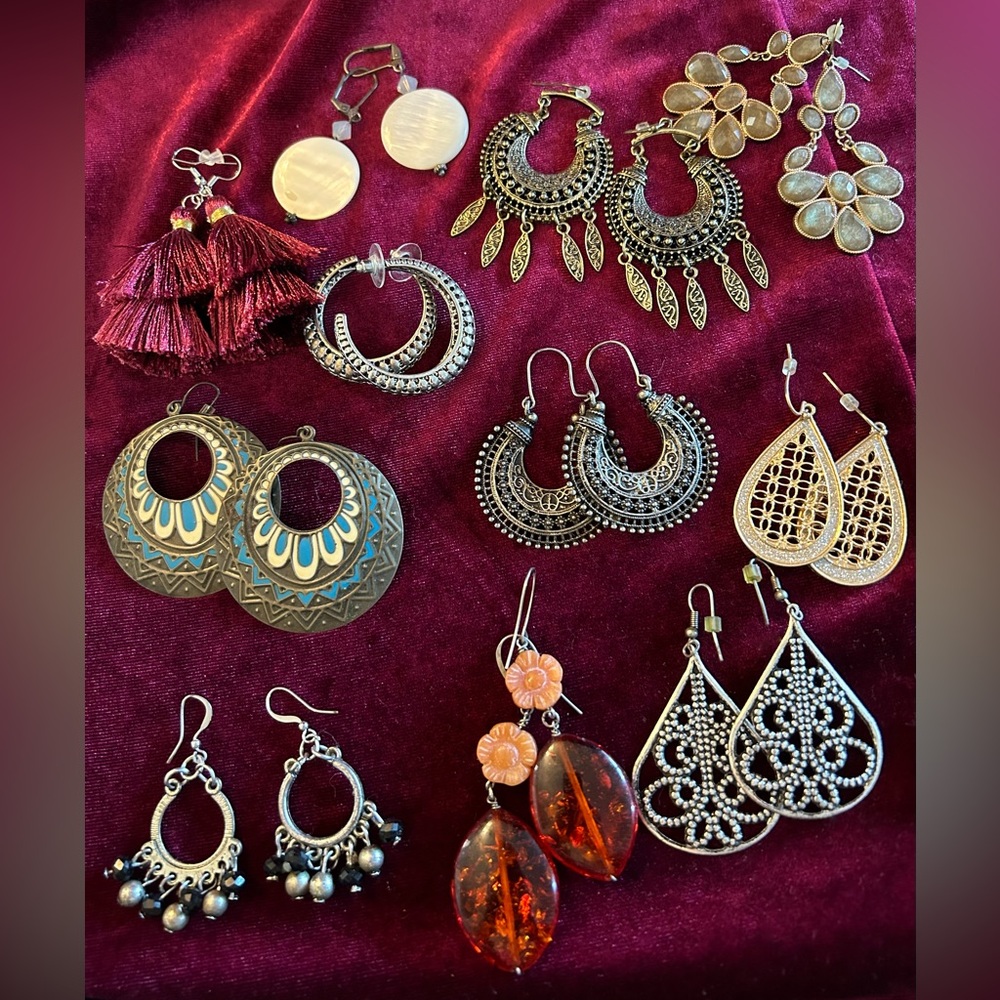 Lot of eleven pairs of dangle, boho,ethnic style earrings.